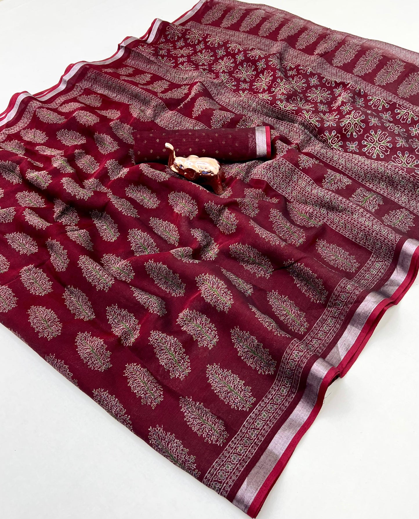 saree with trending ajrakh printed and silver zari border
