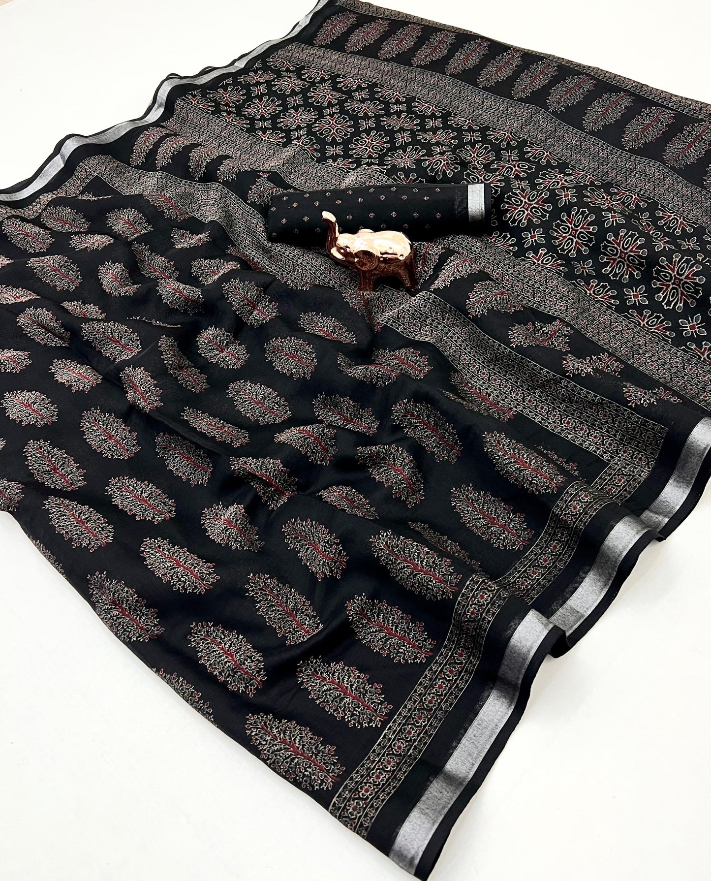 saree with trending ajrakh printed and silver zari border