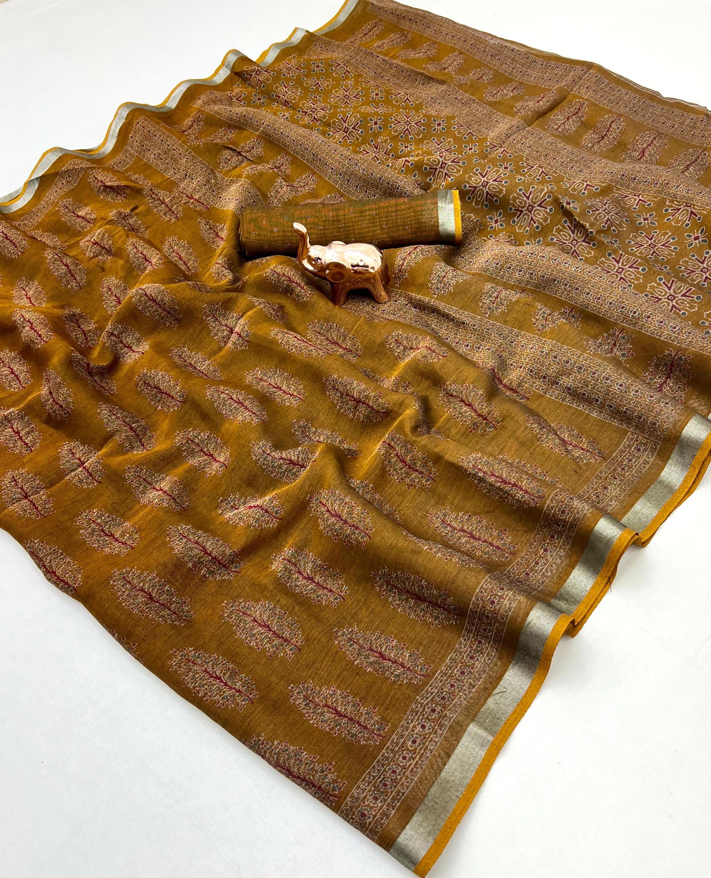 saree with trending ajrakh printed and silver zari border