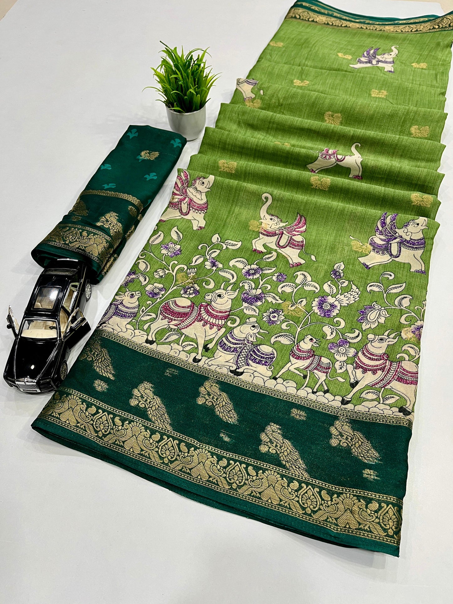 PREMIUM JEQURD VIEWING JARI BUTTI WORK ALL OVER ON SAREE