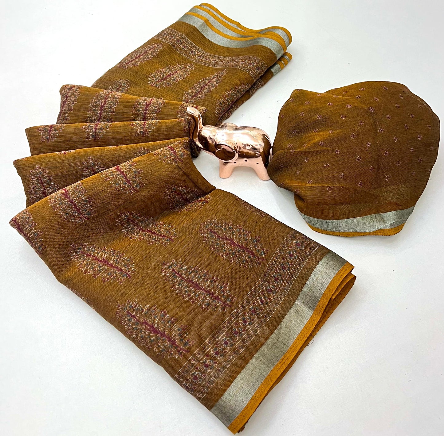saree with trending ajrakh printed and silver zari border
