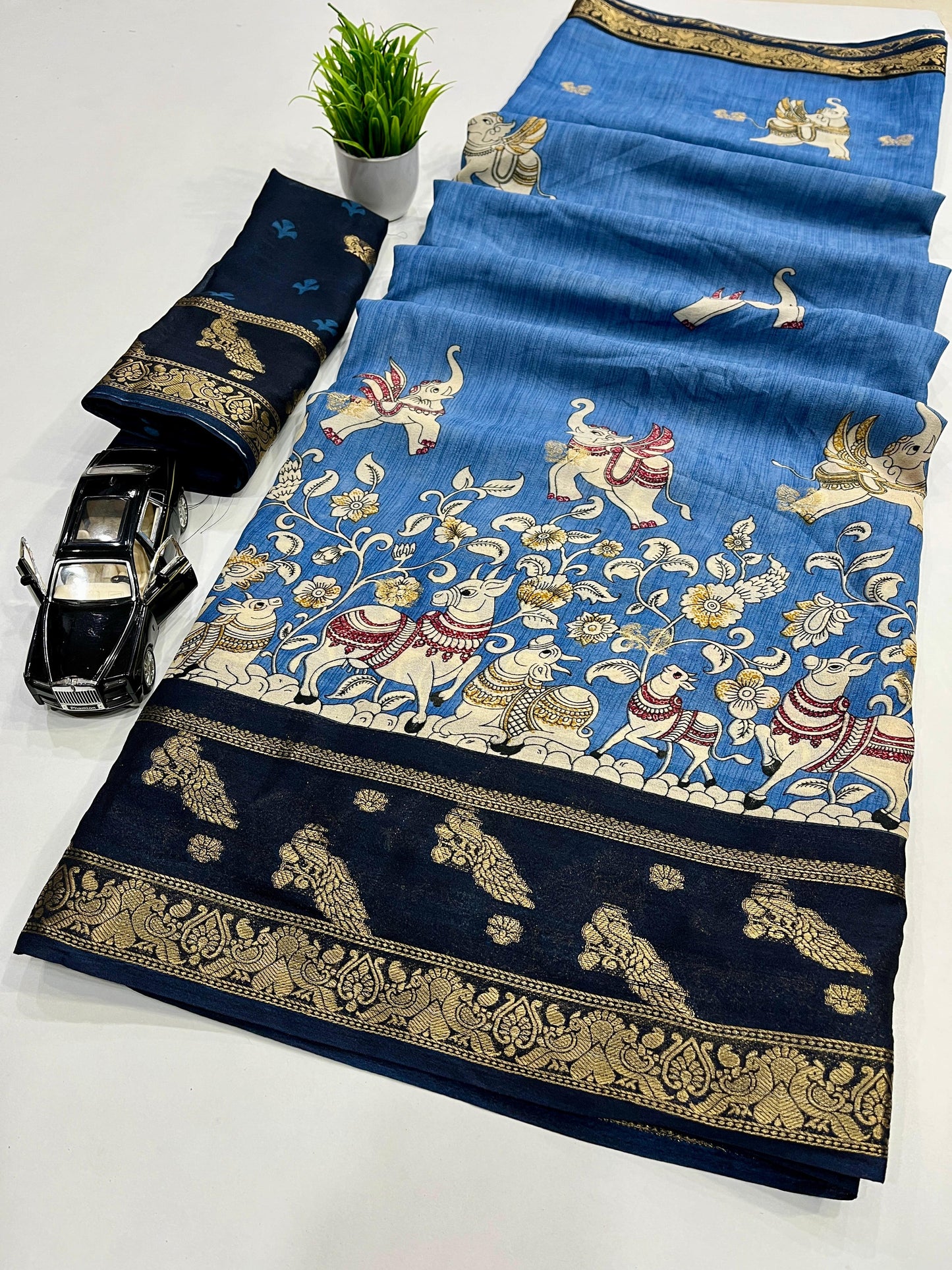 PREMIUM JEQURD VIEWING JARI BUTTI WORK ALL OVER ON SAREE