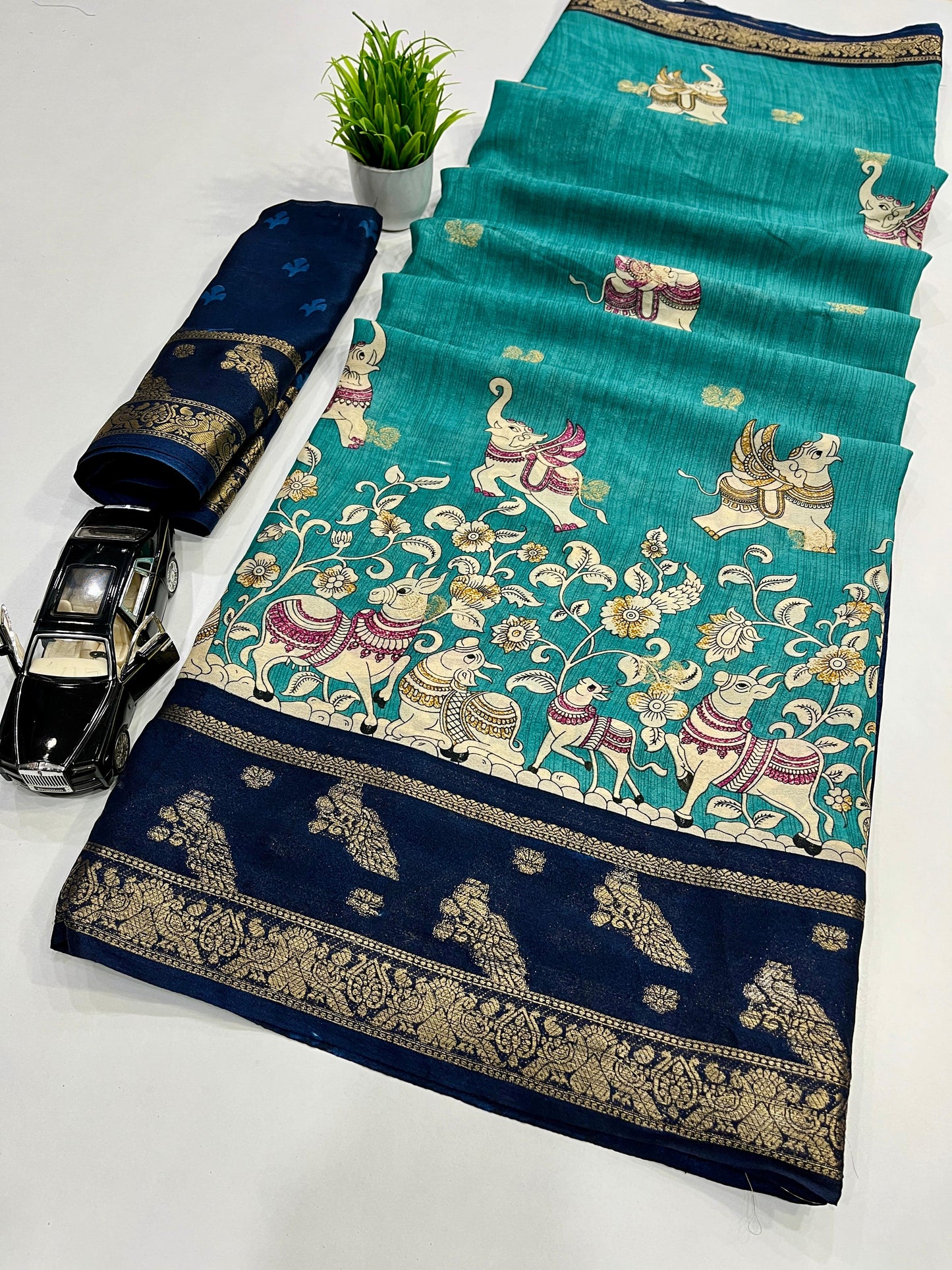 PREMIUM JEQURD VIEWING JARI BUTTI WORK ALL OVER ON SAREE
