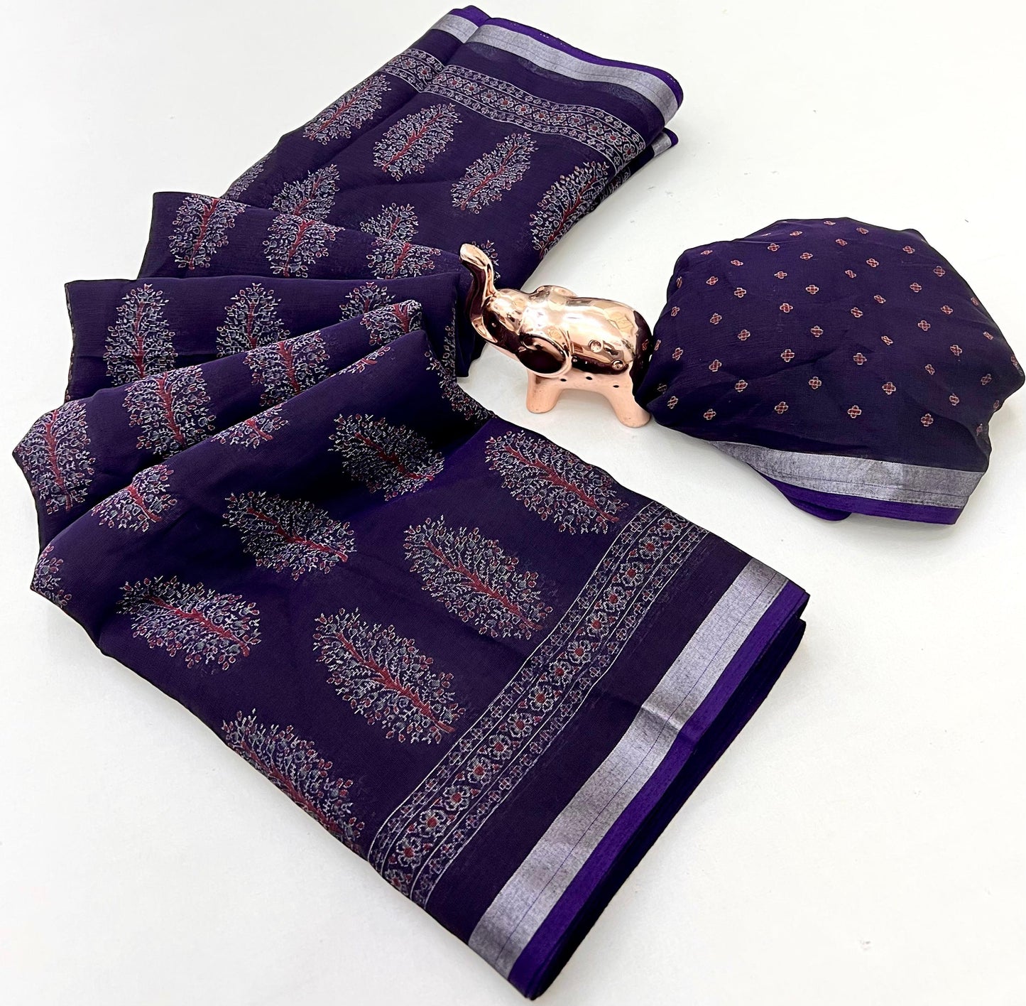 saree with trending ajrakh printed and silver zari border